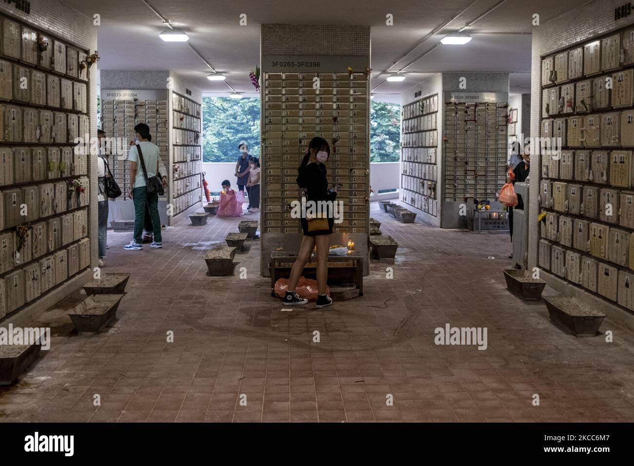 People pay respect at a columbarium during the Ching Ming Festival