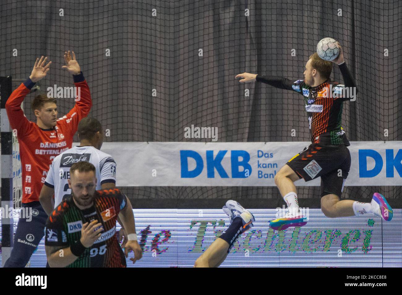 Daniel Pettersson (right) Magdeburg controls the ball during the LIQUI MOLY Handball-Bundesliga match between SC Magdeburg and SG Flensburg-Handewitt at GETEC-Arena on April 04, 2021 in Magdeburg, Germany. (Photo by Peter Niedung/NurPhoto) Stock Photo