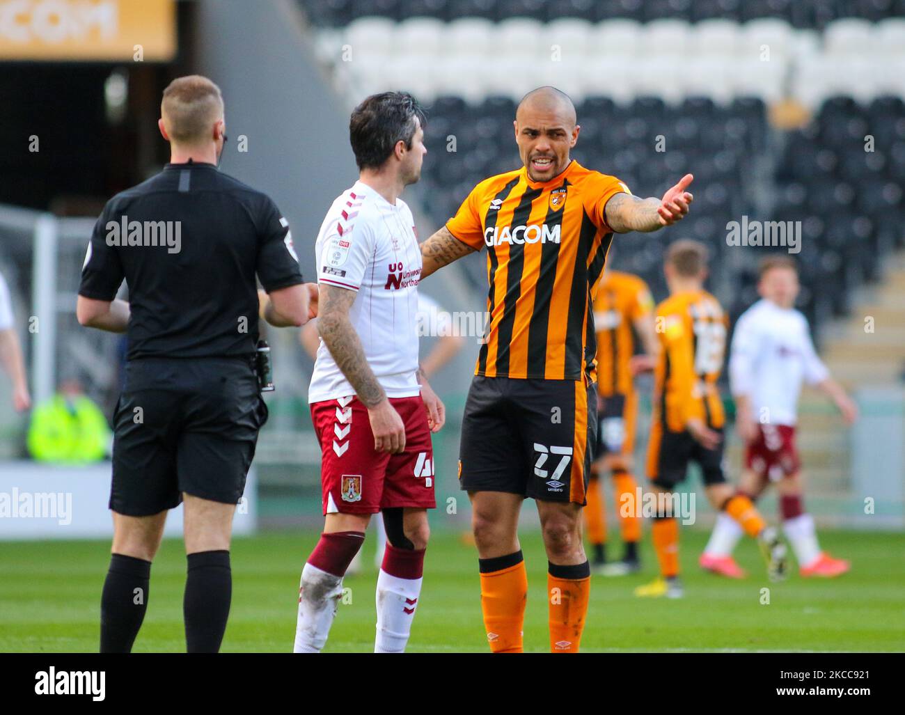 Hull City's Josh Magennis agues with Northampton Town's Alan Sheehan during the Sky Bet League 1 match between Hull City and Northampton Town at the KC Stadium, Kingston upon Hull, England on 5th April 2021. (Photo by Michael Driver/MI News/NurPhoto) Stock Photo