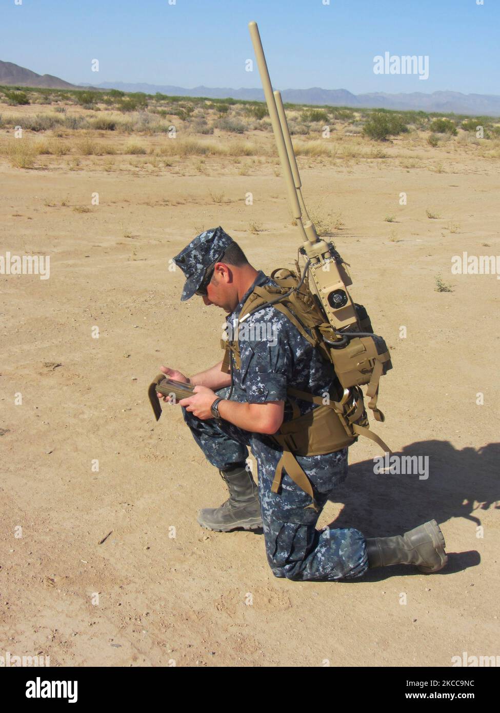 U.S. Navy Soldier wearing the Joint Counter Radio-Controlled Improvised Explosive Device Electronic Warfare device Stock Photo