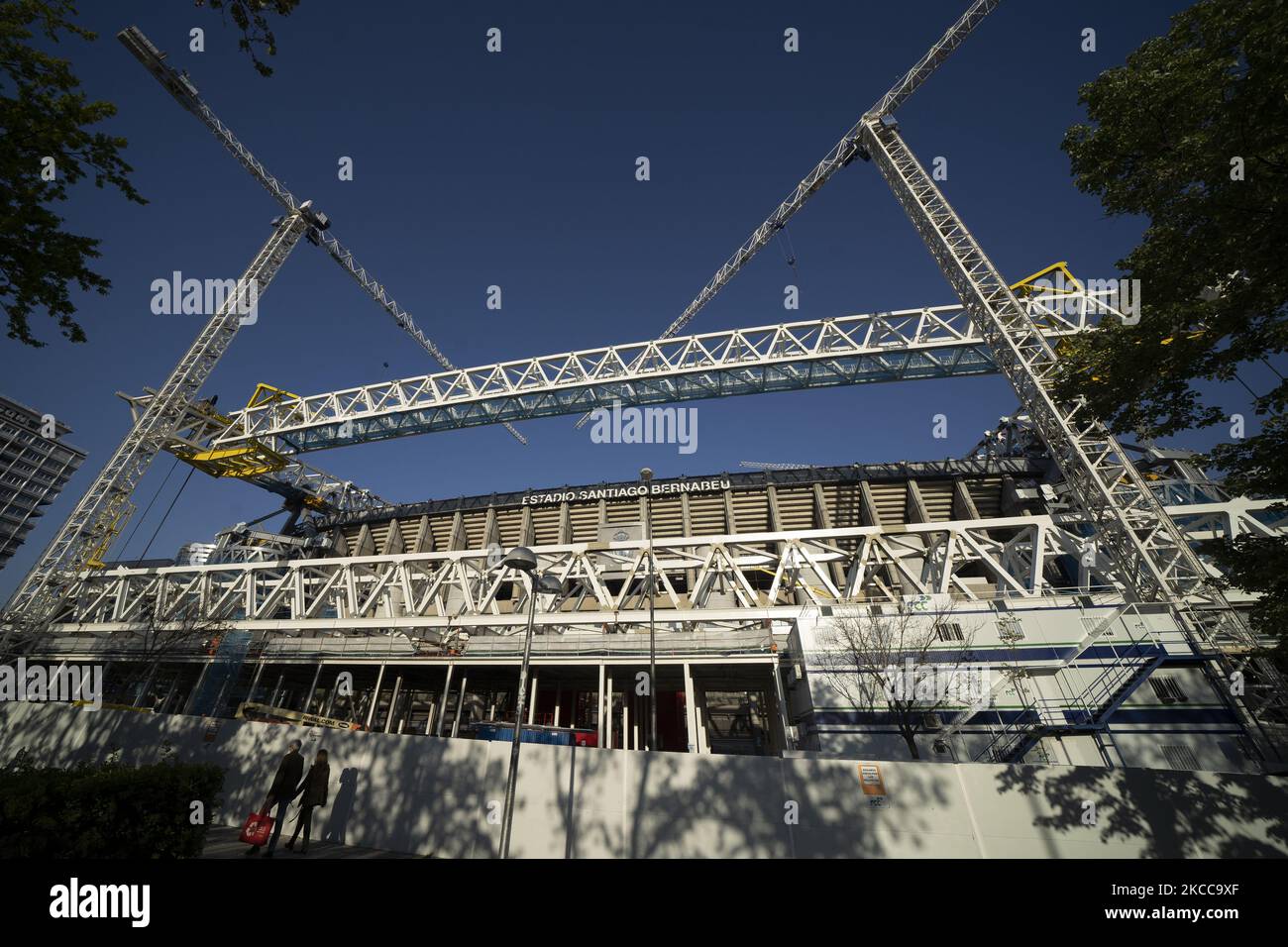 View of the remodeling works of the Santiago Bernabeu stadium of Real Madrid, a retractable roof to acquire a futuristic exterior appearance, the increase of twelve meters in the height of the enclosure and a luxury hotel are the most outstanding novelties of the reform. On April 5, 2021 in Madrid, Spain. (Photo by Oscar Gonzalez/NurPhoto) Stock Photo