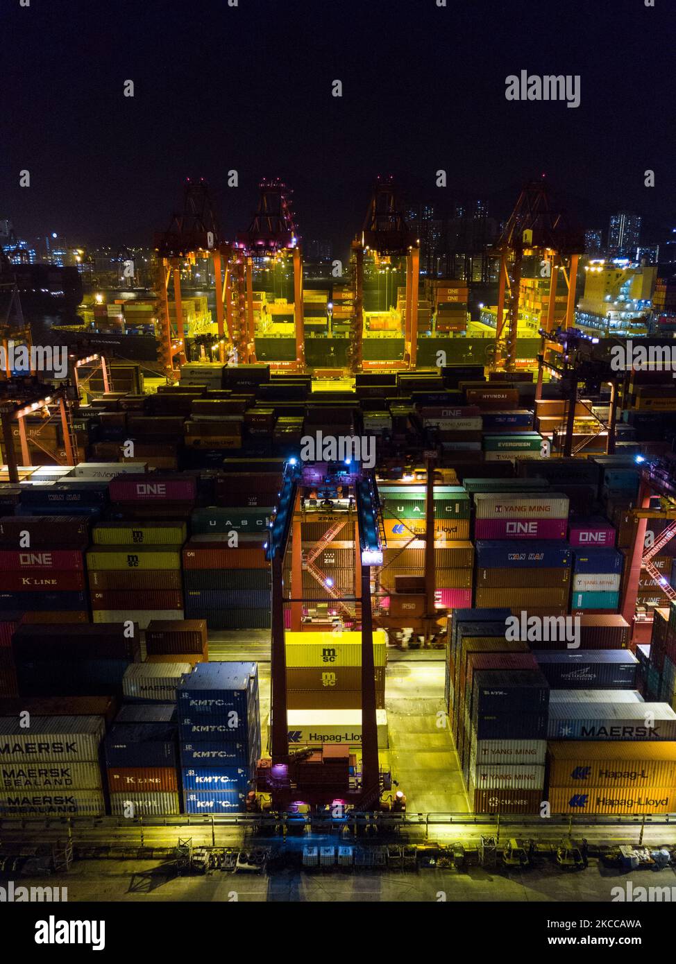 A drone view of the Kwai Chung container terminal at night in Hong Kong, China, on 6 Apr 2021. (Photo by Marc Fernandes/NurPhoto) Stock Photo