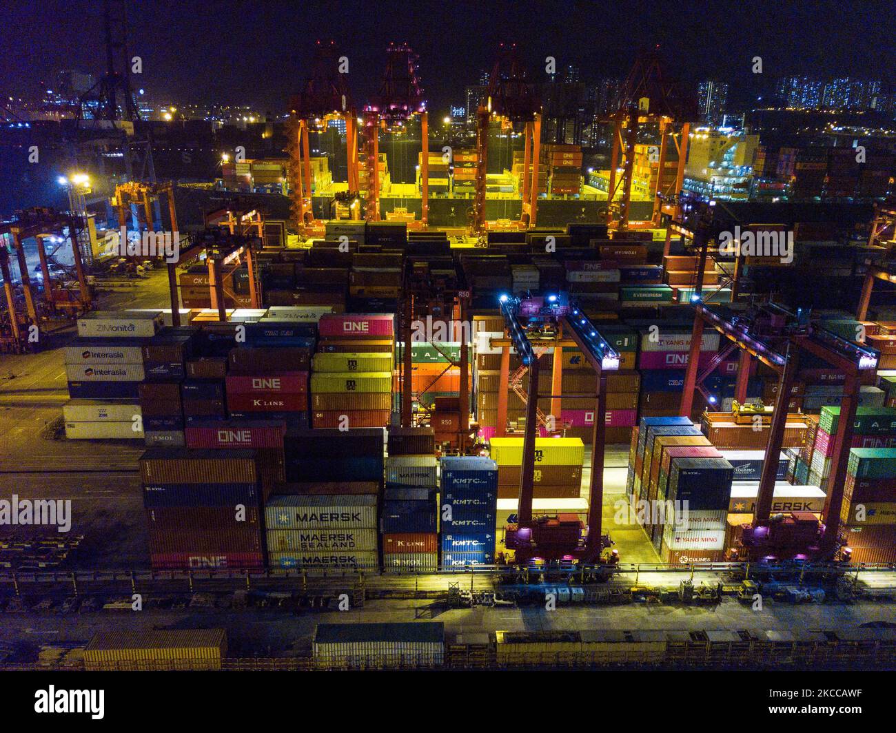 A drone view of the Kwai Chung container terminal at night in Hong Kong, China, on 6 Apr 2021. (Photo by Marc Fernandes/NurPhoto) Stock Photo