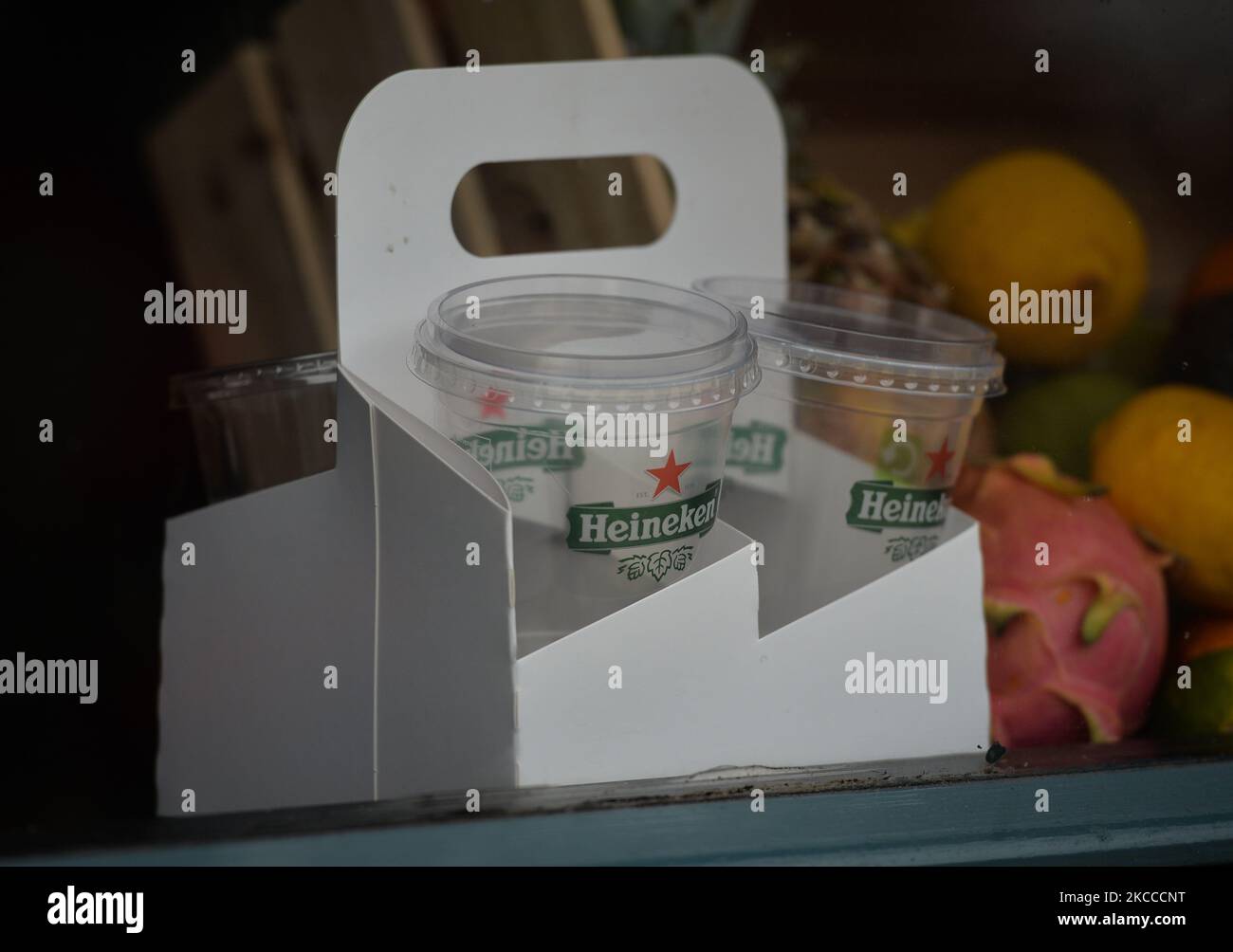 A pub window in Dublin city center advertising take away Heineken beer