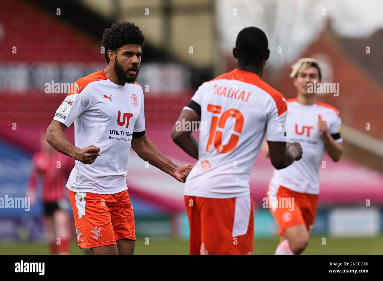 Ellis Simms of Blackpool celebrates scoring with teammates during the Sky Bet League 1 match between Lincoln City and Blackpool at LNER Stadium, Lincoln, England on 10th April 2021. (Photo by James Holyoak/MI News/NurPhoto) Stock Photo