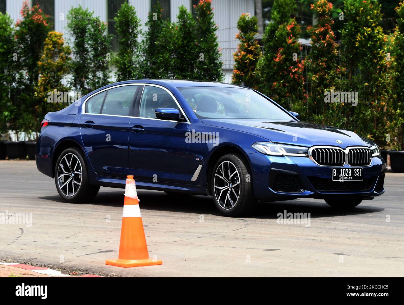 The new BMW ''The New 5'' Type BMW 520i M Sport shows excellence in the driving test at the BMW Test Day event in Karawaci, Tangerang, Banten, on April, 10, 2021. This business sedan car assembled in Indonesia boasts an exclusive interior and comfort. when in or in the wheelhouse with safety sensor facilities while driving and priced at Rp1.1 billion. (Photo by Dasril Roszandi/NurPhoto) Stock Photo
