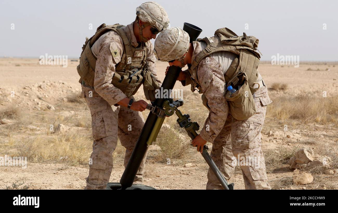 U.S. Marines assemble a new M252A2 81mm mortar system. Stock Photo
