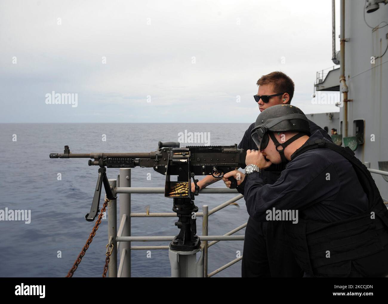 Aviation Boatswain's Mate fires a M240 machine gun Stock Photo Alamy