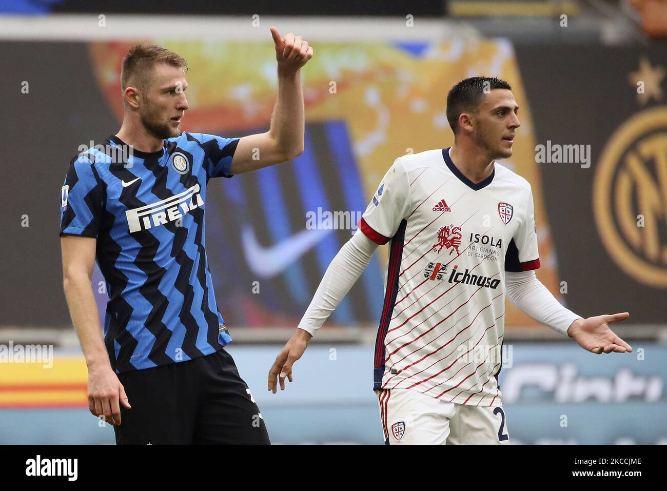 Milan Skriniar of FC Internazionale gestures during the Serie A match between FC Internazionale and Cagliari Calcio at Stadio Giuseppe Meazza on April 11, 2021 in Milan, Italy. Sporting stadiums around Italy remain under strict restrictions due to the Coronavirus Pandemic as Government social distancing laws prohibit fans inside venues resulting in games being played behind closed doors. (Photo by Giuseppe Cottini/NurPhoto) Stock Photo