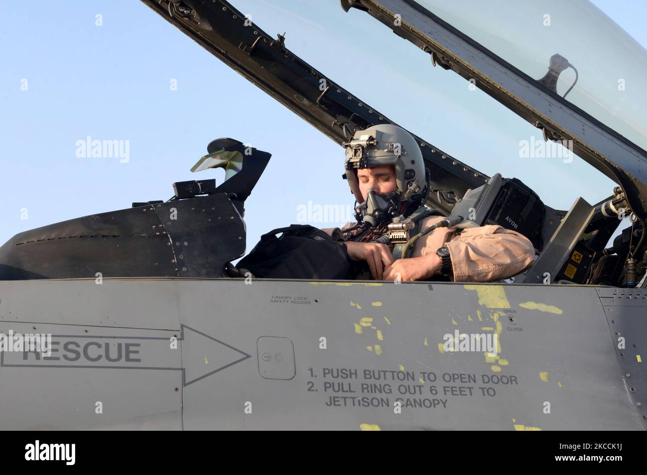 Pilot sits inside a U.S. Air Force F-16 Fighting Falcon. Stock Photo