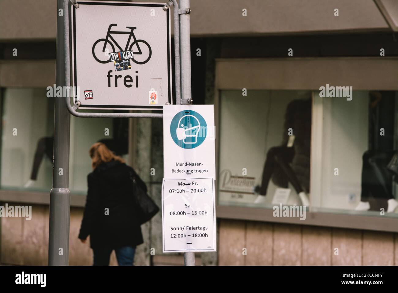 mask sign is seen in the city center of Schwelm, Germany on April 13, 2021 (Photo by Ying Tang/NurPhoto) Stock Photo