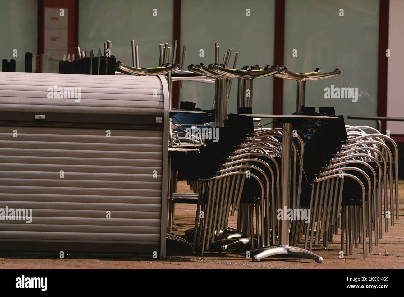 chairs are seen stacked outside in the city center of Schwelm, Germany on April 13, 2021 (Photo by Ying Tang/NurPhoto) Stock Photo