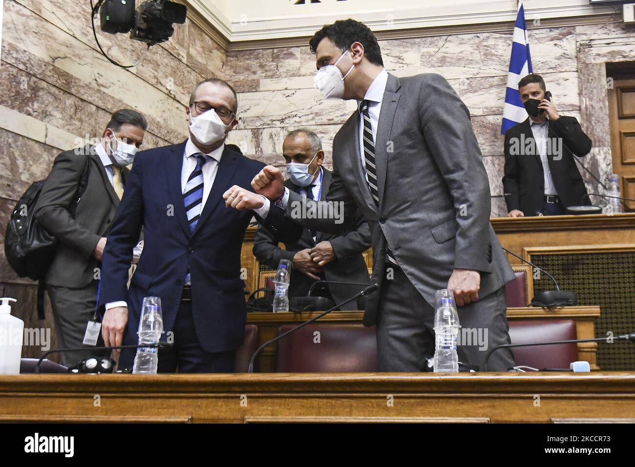 Greek Health Minister Vassilis Kikilias (L) briefs MPs on national health strategy. The briefing is attended by Hans Henri Kluge, regional director for Europe at the World Health Organisation in Athens, Greece, on 15 April, 2021. (Photo by Dimitris Lampropoulos/NurPhoto) Stock Photo