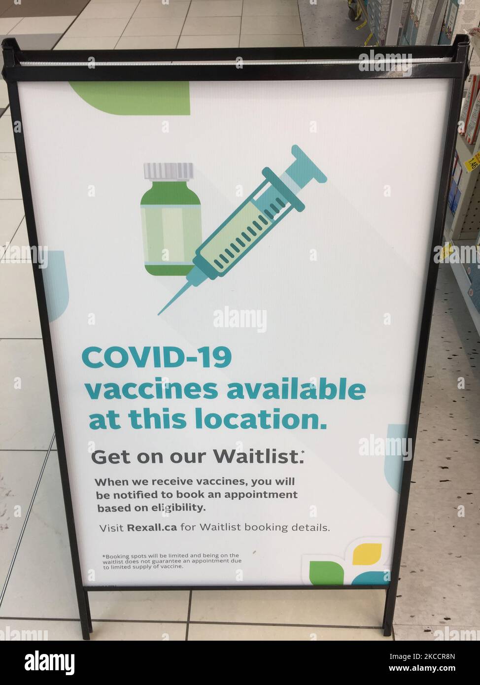 Sign at a pharmacy informing people to join the waitlist to receive the AstraZeneca / COVISHIELD novel coronavirus (COVID-19) vaccine in Markham, Ontario, Canada on April 15, 2021. The AstraZeneca COVID?19 Vaccine (manufactured by AstraZeneca) and COVISHIELD (manufactured by Serum Institute of India) has been plagued with bad press after recent studies confirmed that the Oxford-AstraZeneca vaccine may cause very rare blood clots. Health Canada has insured the shot is safe and reiterated that the benefits of getting the shot outweigh the risks. This comes as a Quebec woman was reported to be th Stock Photo