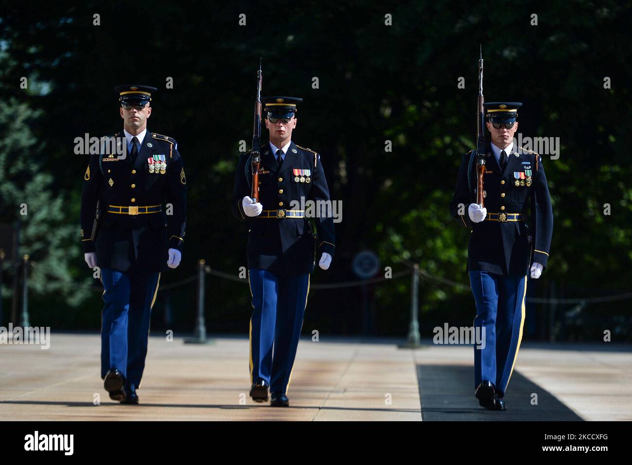 Army Honor Guard soldiers perform the Changing of the Guard at Arlington National Cemetery. Stock Photo