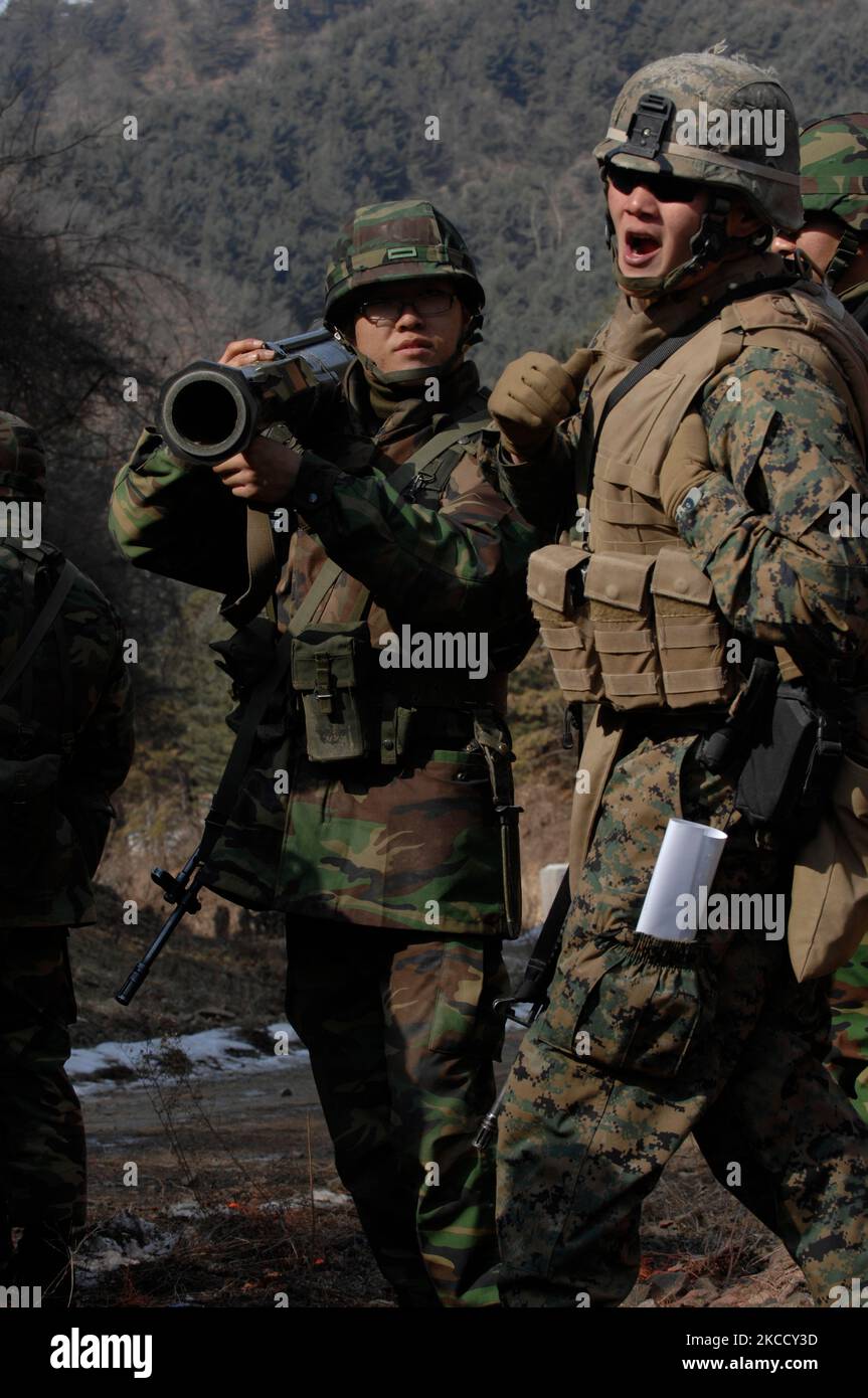 U.S. Marine instructs Republic of Korea Marines on the proper use of