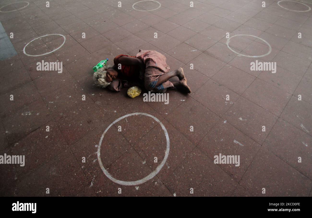 Social distance marks are seen on the floor of the city railway station due to Covid-19 coronavirus again spike in the eastern Indian state Odisha's capital city Bhubaneswar, on April 18, 2021. (Photo by STR/NurPhoto) Stock Photo