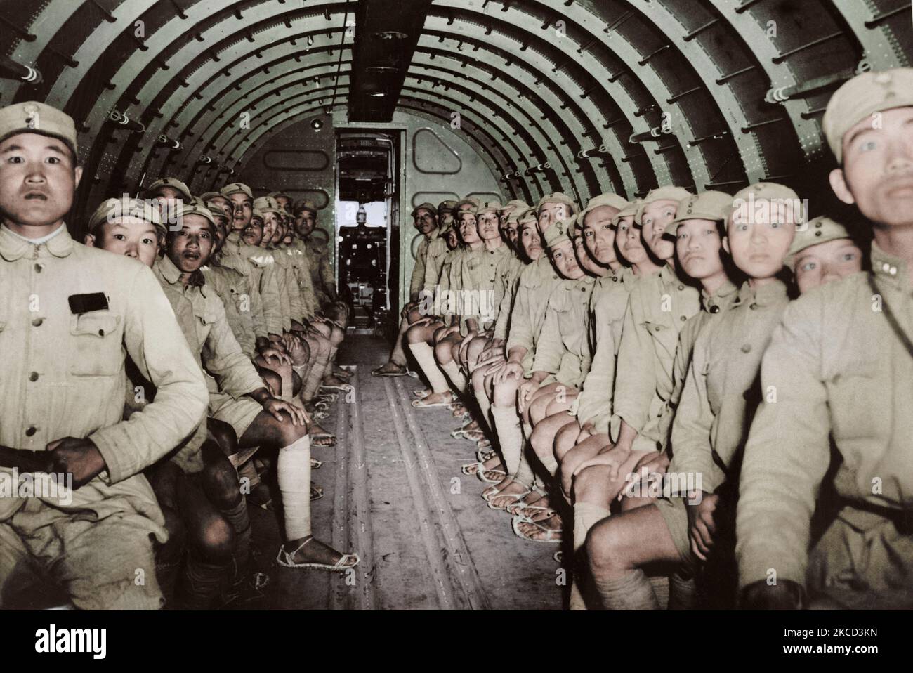 Chinese soldiers enroute to India inside of a DC-3 aircraft, circa 1943. Stock Photo