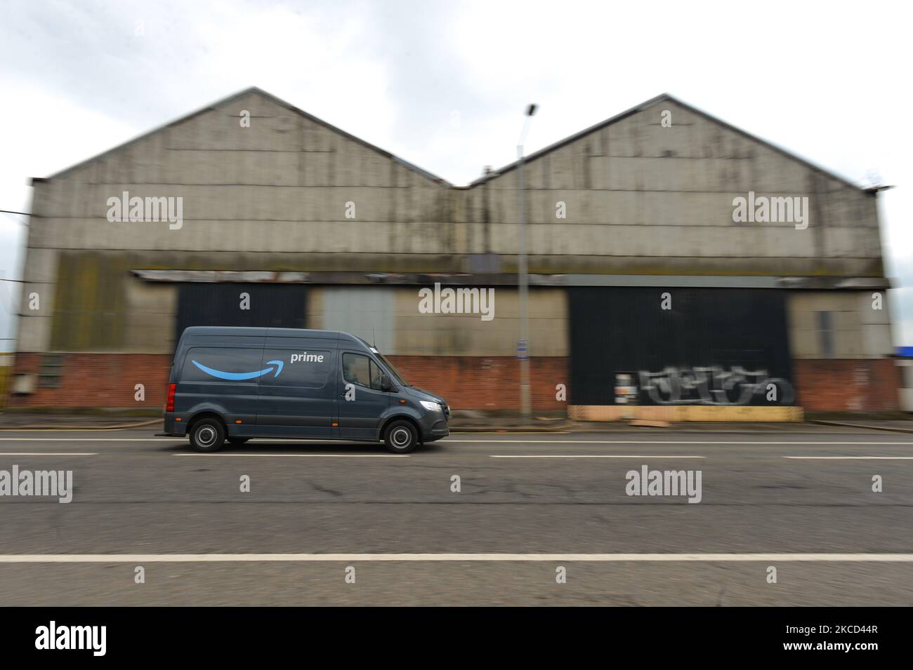 Amazon Prime van seen in the Titanic Quarter in Belfast. Packages are shipped to the delivery station from Amazon fulfillment and sorting centers and loaded onto vehicles for delivery to Amazon customers in the Belfast area. On Tuesday, April 20, 2021, in Belfast, Northern Ireland. (Photo by Artur Widak/NurPhoto) Stock Photo