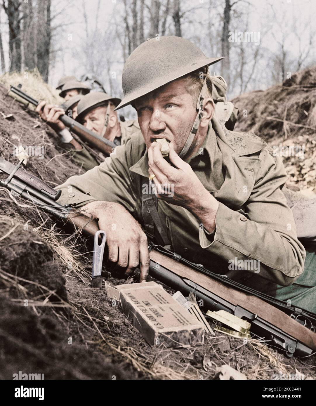 U.S. soldier eating field ration, circa 1942. Stock Photo
