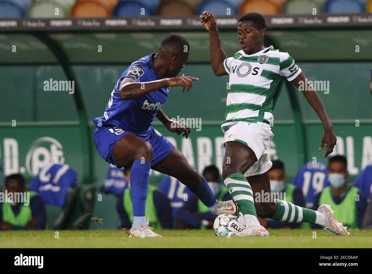 Nuno Mendes and Cafu in action during the game for Liga NOS between Belenenses SAD and SL Benfica, at Estadio Alvalade, Lisboa, Portugal, 21, April, 2021 (Photo by João Rico/NurPhoto) Stock Photo