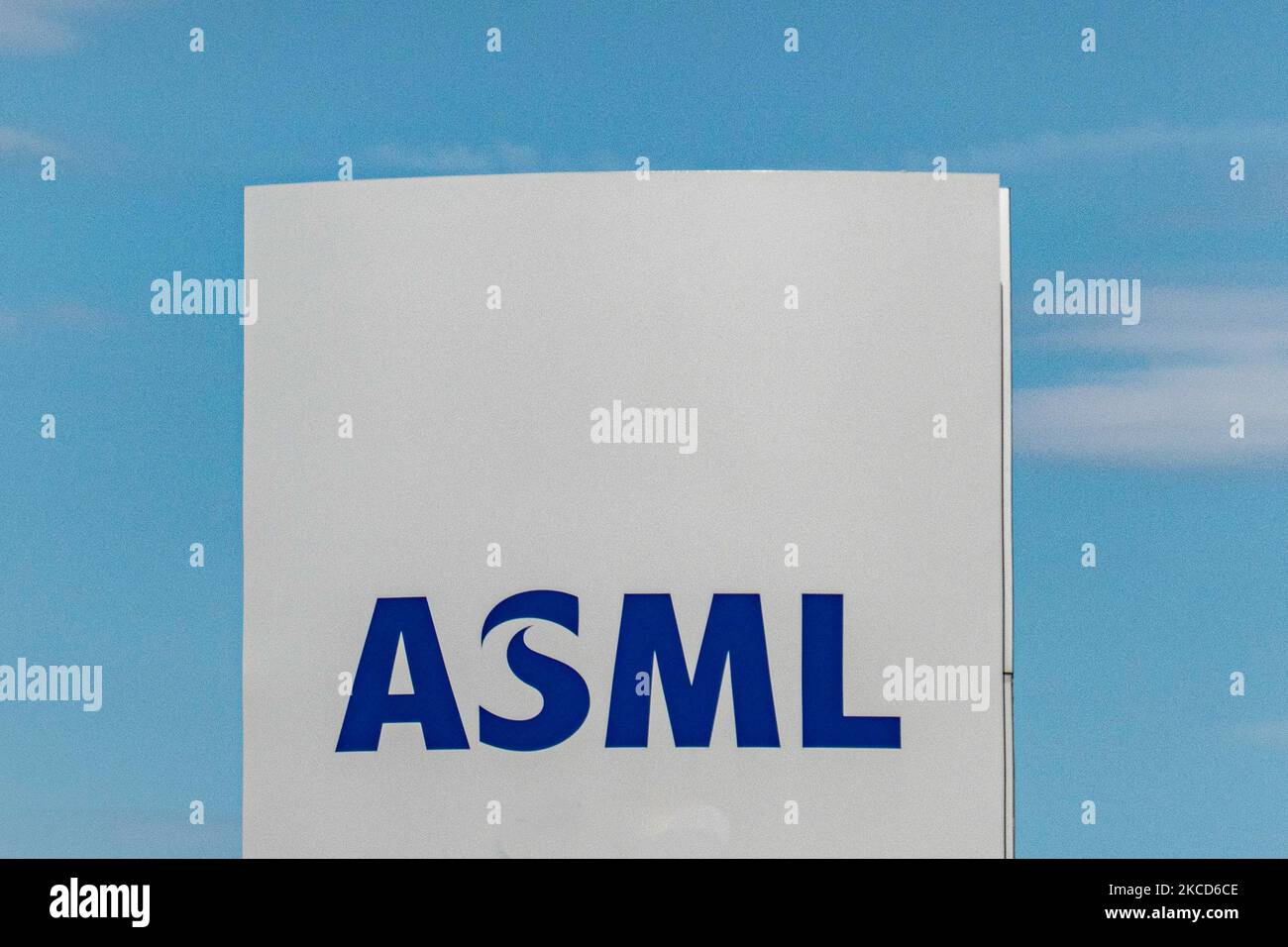 ASML logo billboard near the airport of Eindhoven. ASML is a Dutch multinational company manufacturing machines of photolithography systems, the largest supplier for the semiconductor industry in the world based in Veldhoven. ASML reported Sales up to 30% in Q1 2021 as the chip shortage boosts demand. Eindhoven, the Netherlands on April 21 2021 (Photo by Nicolas Economou/NurPhoto) Stock Photo