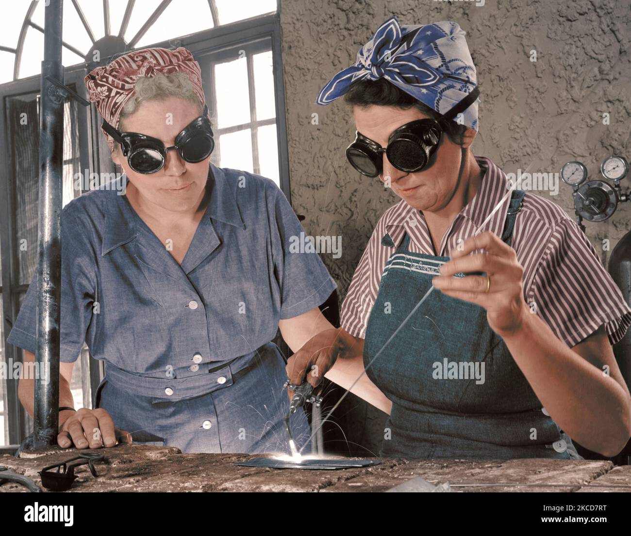 Women welders in World War II, circa 1940's. Stock Photo