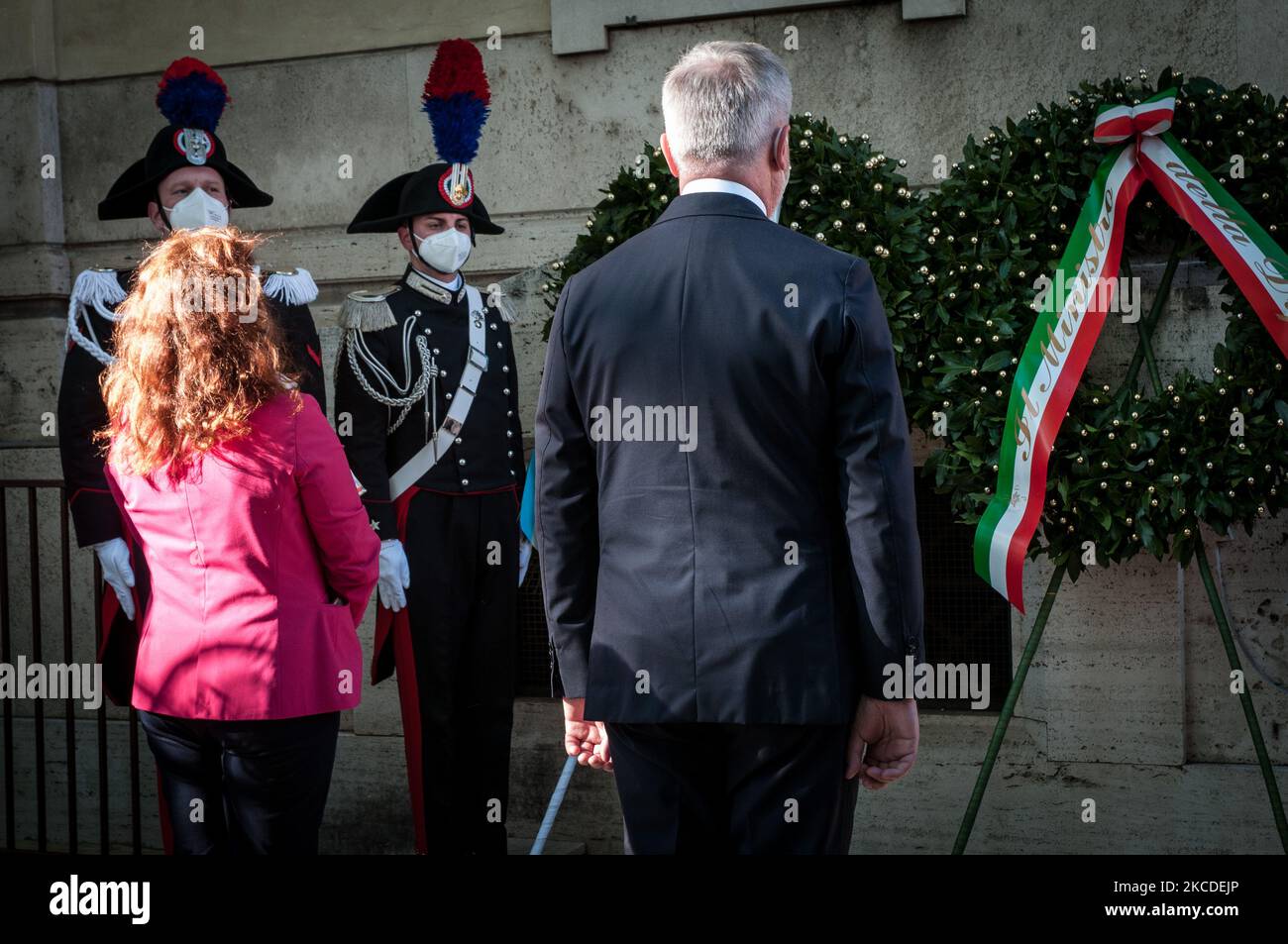 Italian Defense Minister Lorenzo Guerini and the President of the Jewish Community of Rome Ruth Dureghello (L) attend the celebration of the 76th anniversary of the Liberation of Italy from Nazi-fascism. The Jewish Community of Rome commemorates in front of the plaque affixed in memory of the partisans to the Tempio Maggiore in Rome, Italy on April 25, 2021. (Photo by Andrea Ronchini/NurPhoto) Stock Photo