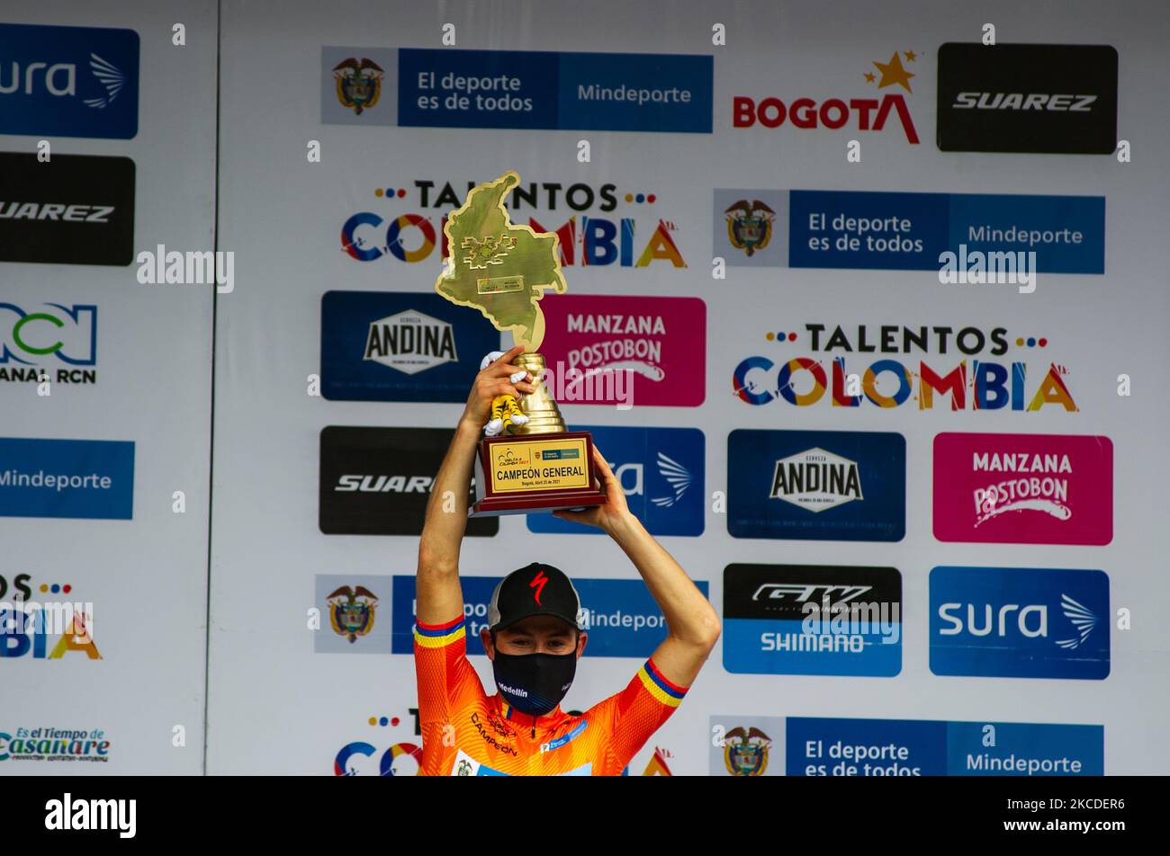 Tito Hernandez, professional ciclyst from Medellin holds the award after winning the 2021 Vuelta a Colombia after a 10 lap race across the city of Bogota, Colombia on April 25, 2021. (Photo by Sebastian Barros/NurPhoto) Stock Photo