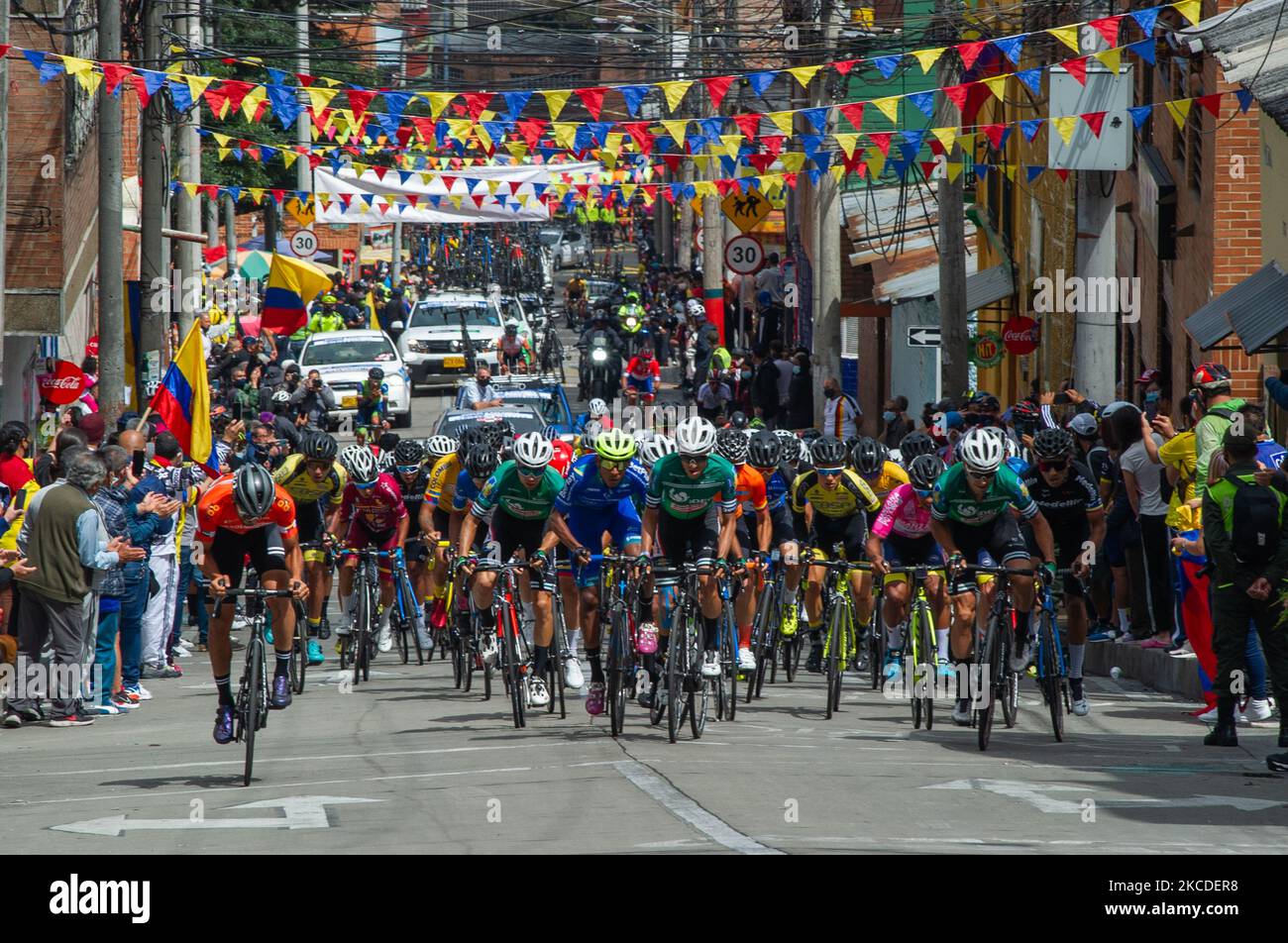 Ciclysts participating in the 2021 Vuelta a Colombia race final in Bogota are cheered up by locals from the Perserverancia neighborhood in Bogota, Colombia on April 25, 2021 won by the Colombian ciclyst Tito Hernandez. (Photo by Sebastian Barros/NurPhoto) Stock Photo