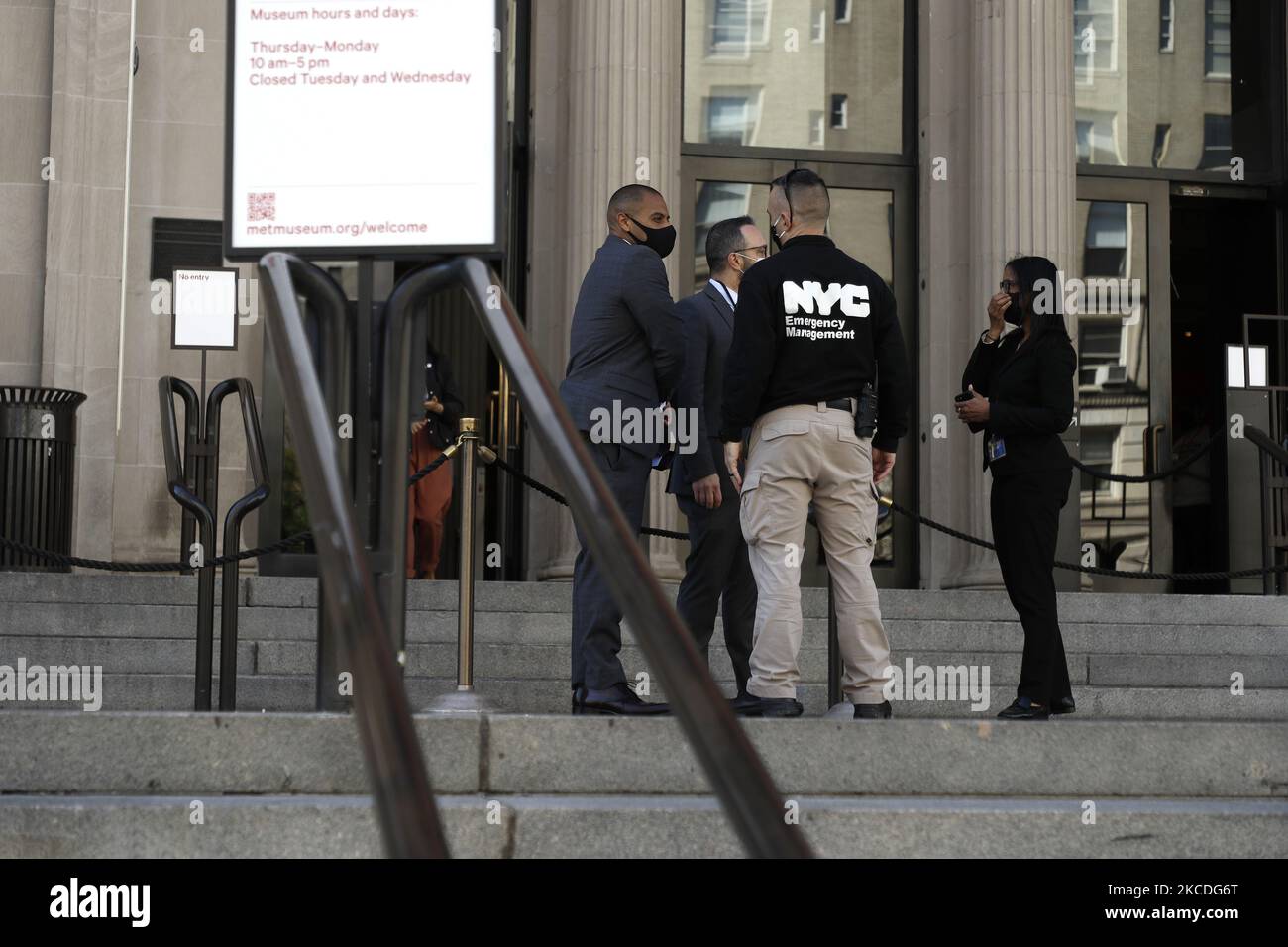 Police officers engage in conversation after the New York Police