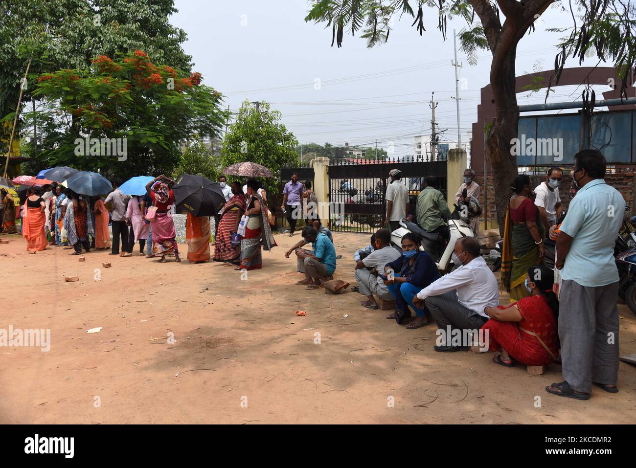 People in queue outside a vaccination centre to get their COVID-19 vaccine, in Guwahati, Assam, India on Friday, 30 April 2021. India enters the third phase of its coronavirus vaccination program it intends to vaccinate all those aged above 18 years from May 1 in the country. (Photo by David Talukdar/NurPhoto) Stock Photo
