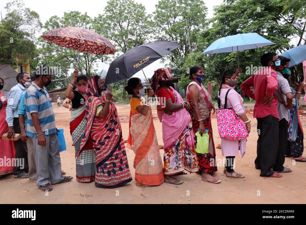 People in queue outside a vaccination centre to get their COVID-19 vaccine, in Guwahati, Assam, India on Friday, 30 April 2021. India enters the third phase of its coronavirus vaccination program it intends to vaccinate all those aged above 18 years from May 1 in the country. (Photo by David Talukdar/NurPhoto) Stock Photo