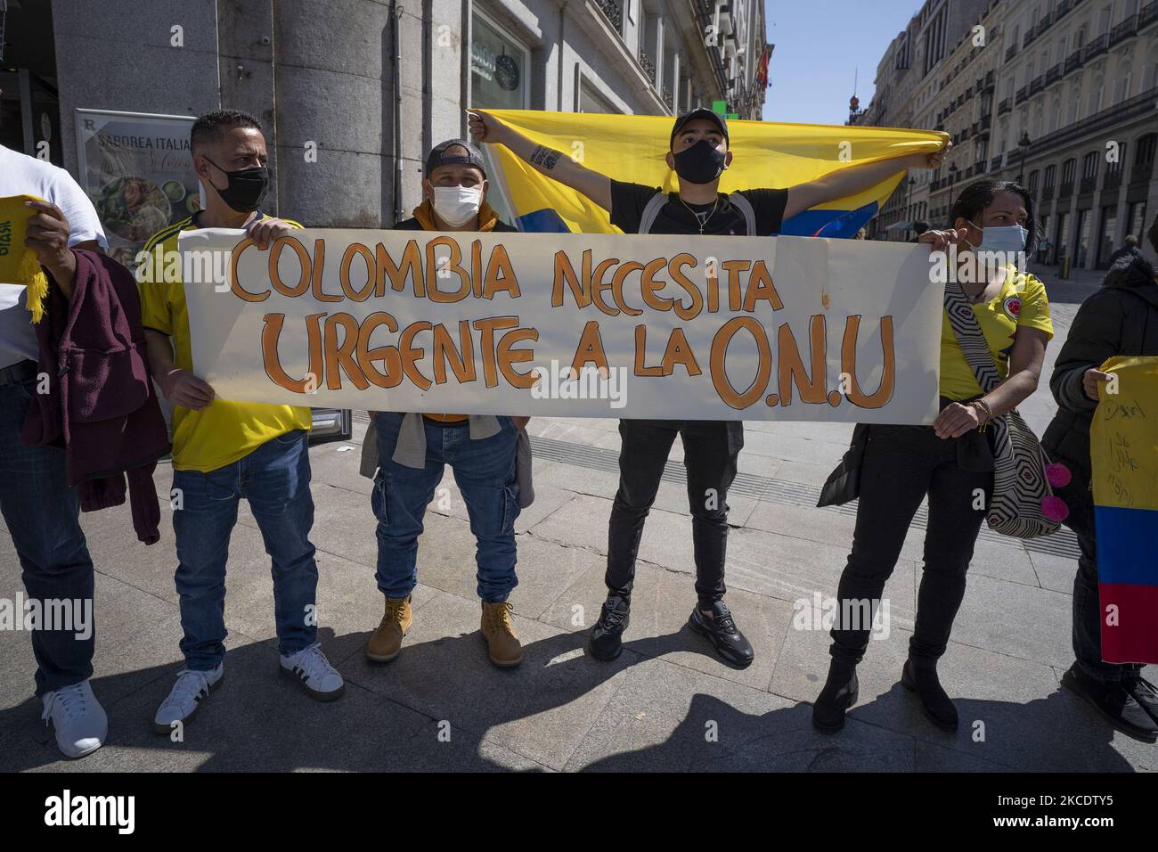 Young people from the Colombian population of Spain demonstrate for the colonvia tax reform, which forces young people to pay more taxes in Colombia, at the Puerta del Sol in Madrid, Spain, on May 2, 2021. (Photo by Oscar Gonzalez/NurPhoto) Stock Photo