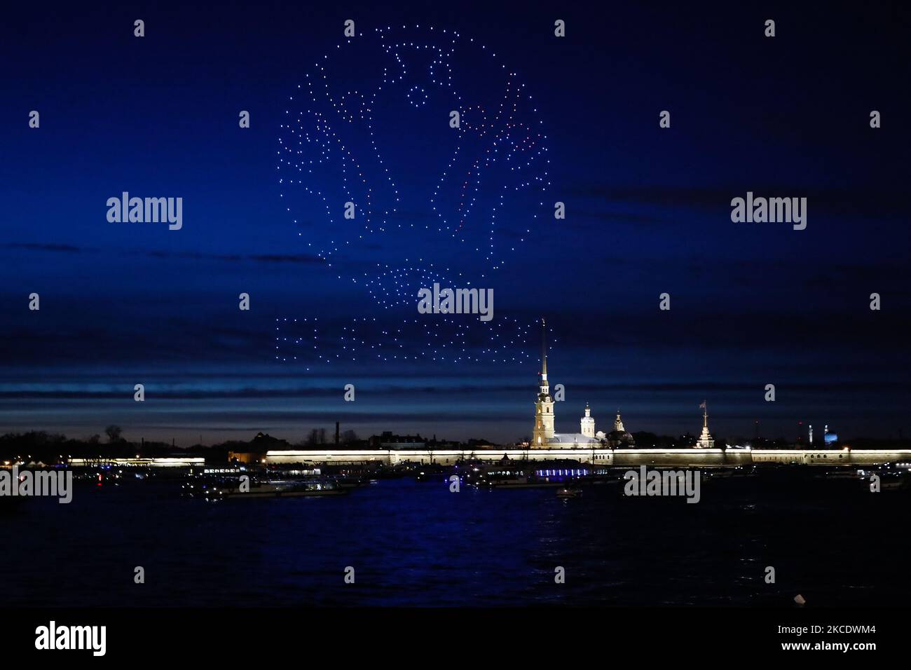 A drone swarm displays UEFA Euro 2020 logo in the night sky above the Peter and Paul (Petropavlovskaya) Fortress on May 2, 2021 in Saint Petersburg, Russia. (Photo by Mike Kireev/NurPhoto) Stock Photo