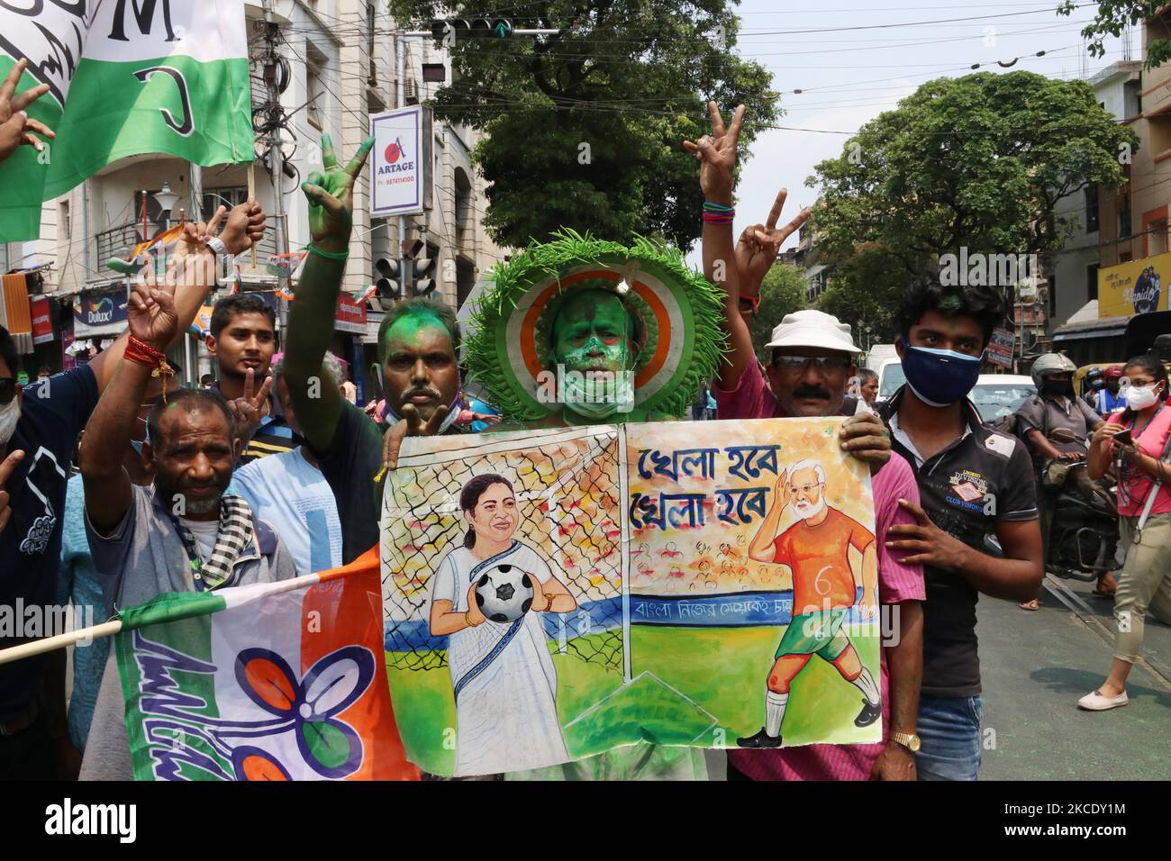 Supporters of Trinamool Congress (TMC) party celebrate their party's lead in the West Bengal state legislative assembly elections during the ongoing counting process in Kolkata on May 2, 2021. (Photo by Debajyoti Chakraborty/NurPhoto) Stock Photo