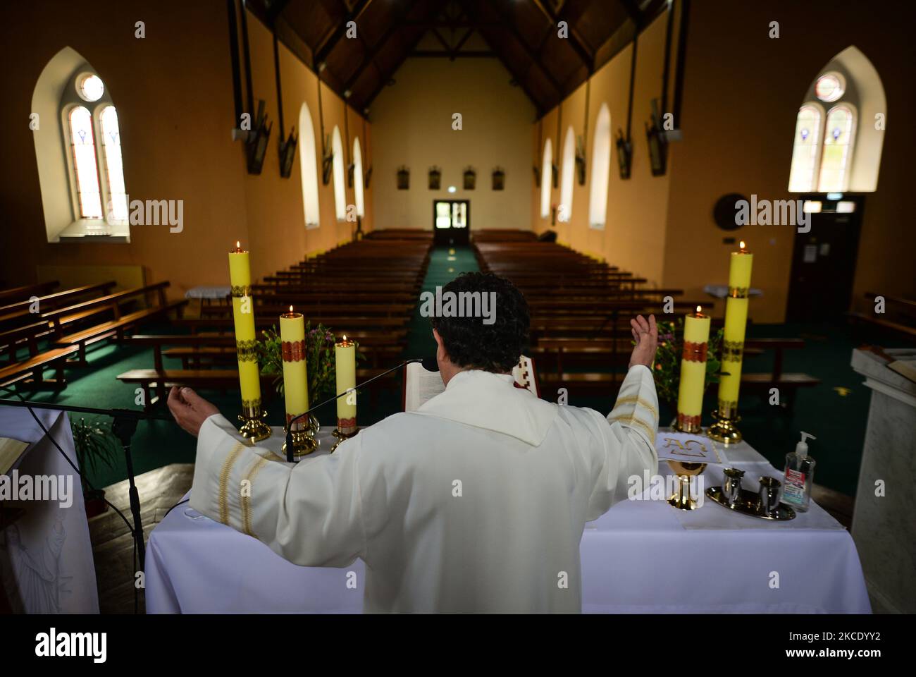 father-krzysztof-sikora-during-a-private-prayer-at-the-closed-and-empty