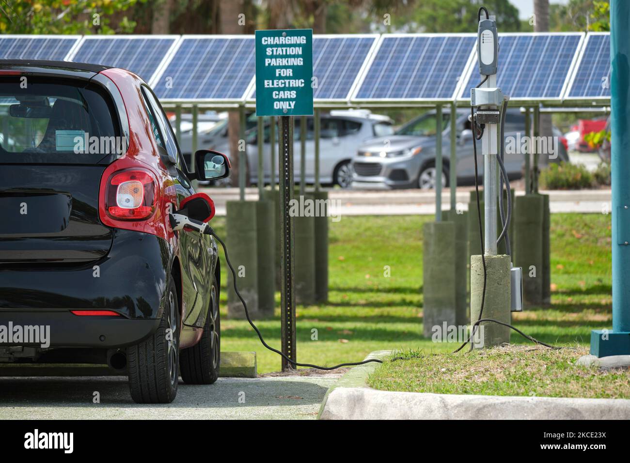 Electric plugin car charging with electricity from solar renewable