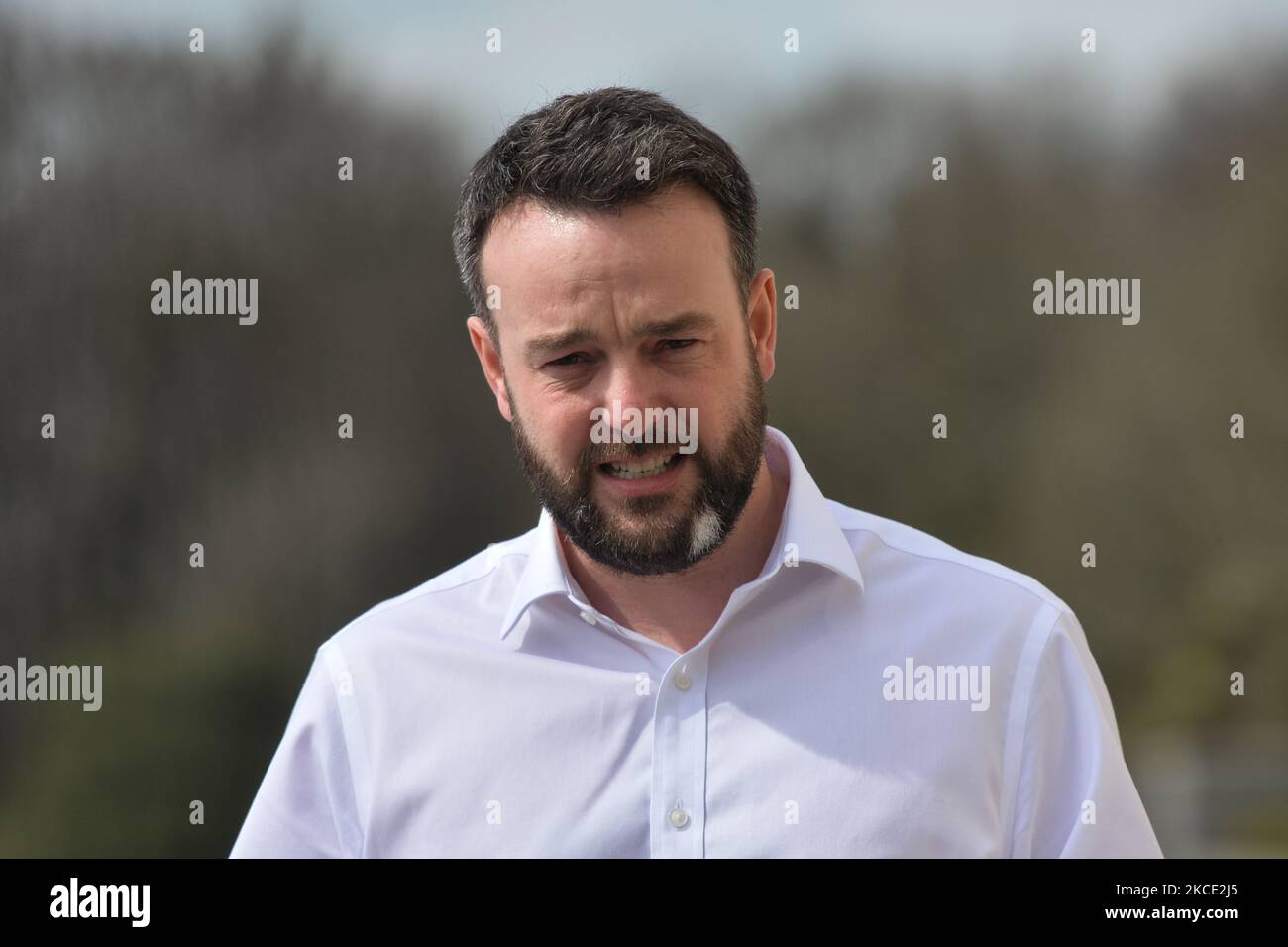 Social Democratic and Labour Party (SDLP) leader Colum Eastwood speaks outside Stormont in Belfast, following a loyalist protest in the city against Brexit's Northern Ireland Protocol. On Monday, April 19, 2021, in Belfast, Northern Ireland (Photo by Artur Widak/NurPhoto) Stock Photo