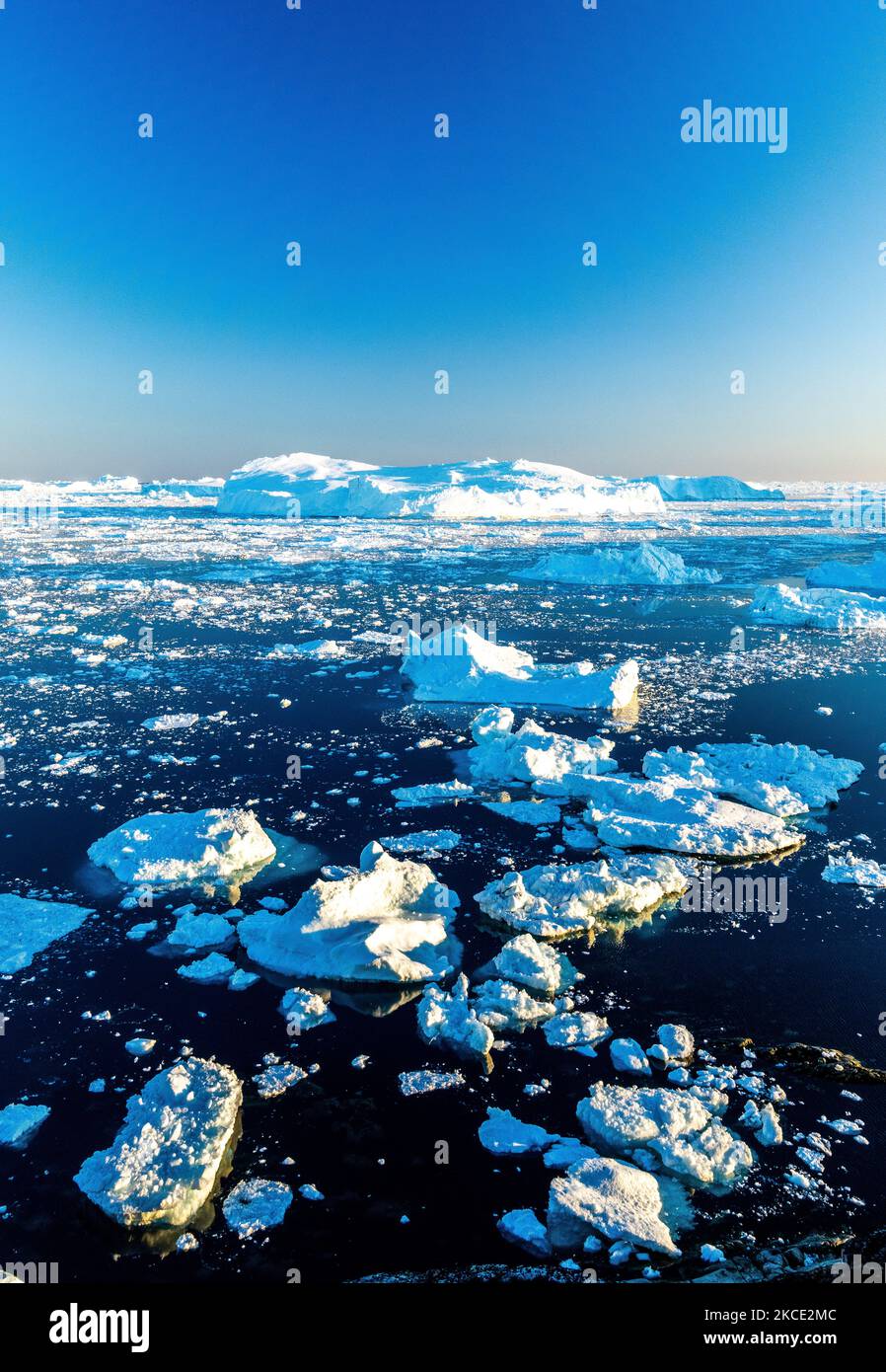 Icebergs near Ilulissat, Greenland. Climate change is having a profound ...