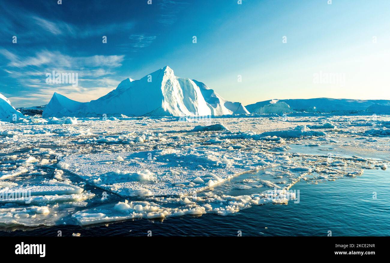 Icebergs near Ilulissat, Greenland. Climate change is having a profound ...