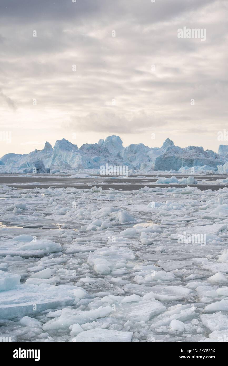 Icebergs near Ilulissat, Greenland. Climate change is having a profound ...