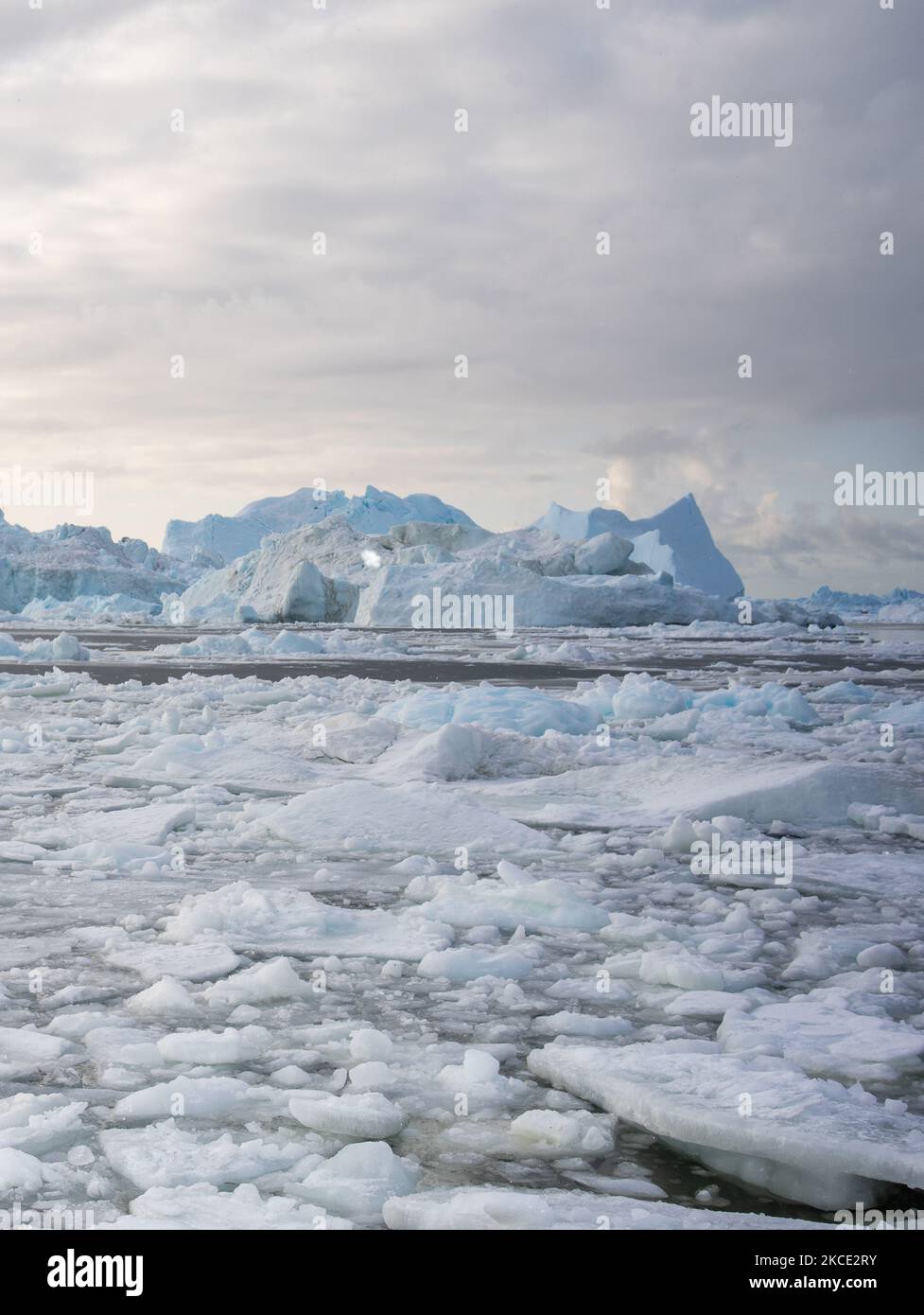 Icebergs near Ilulissat, Greenland. Climate change is having a profound ...