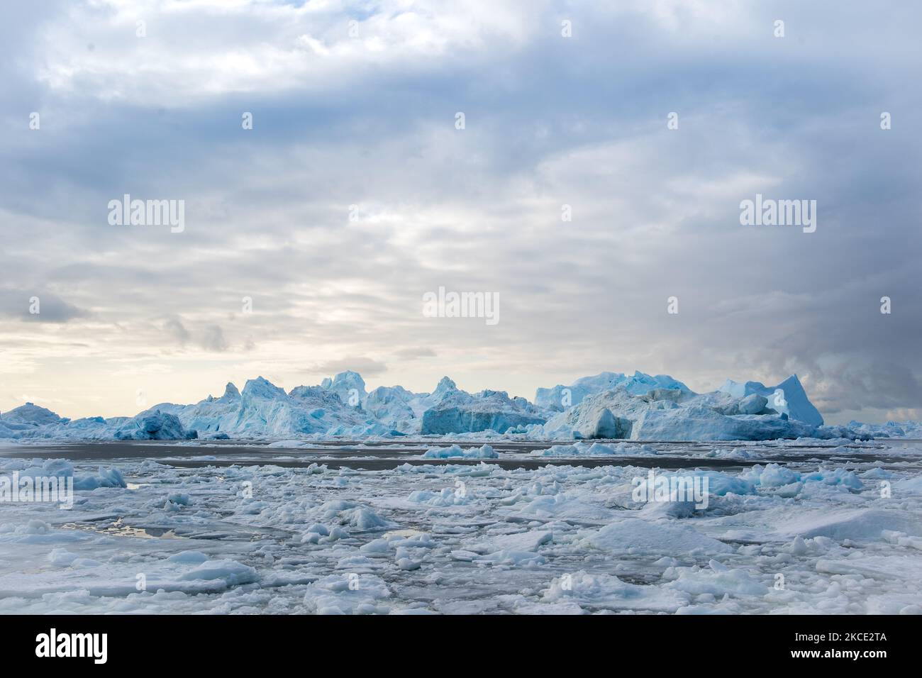 Icebergs near Ilulissat, Greenland. Climate change is having a profound ...