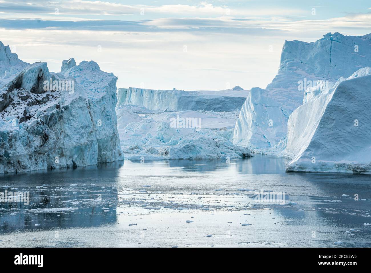 Icebergs near Ilulissat, Greenland. Climate change is having a profound ...
