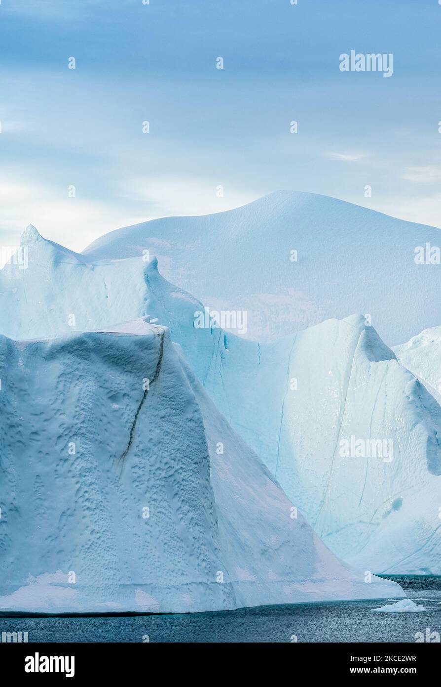 Icebergs near Ilulissat, Greenland. Climate change is having a profound ...