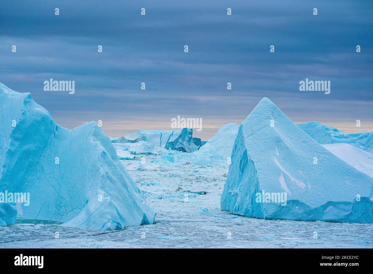 Icebergs near Ilulissat, Greenland. Climate change is having a profound ...