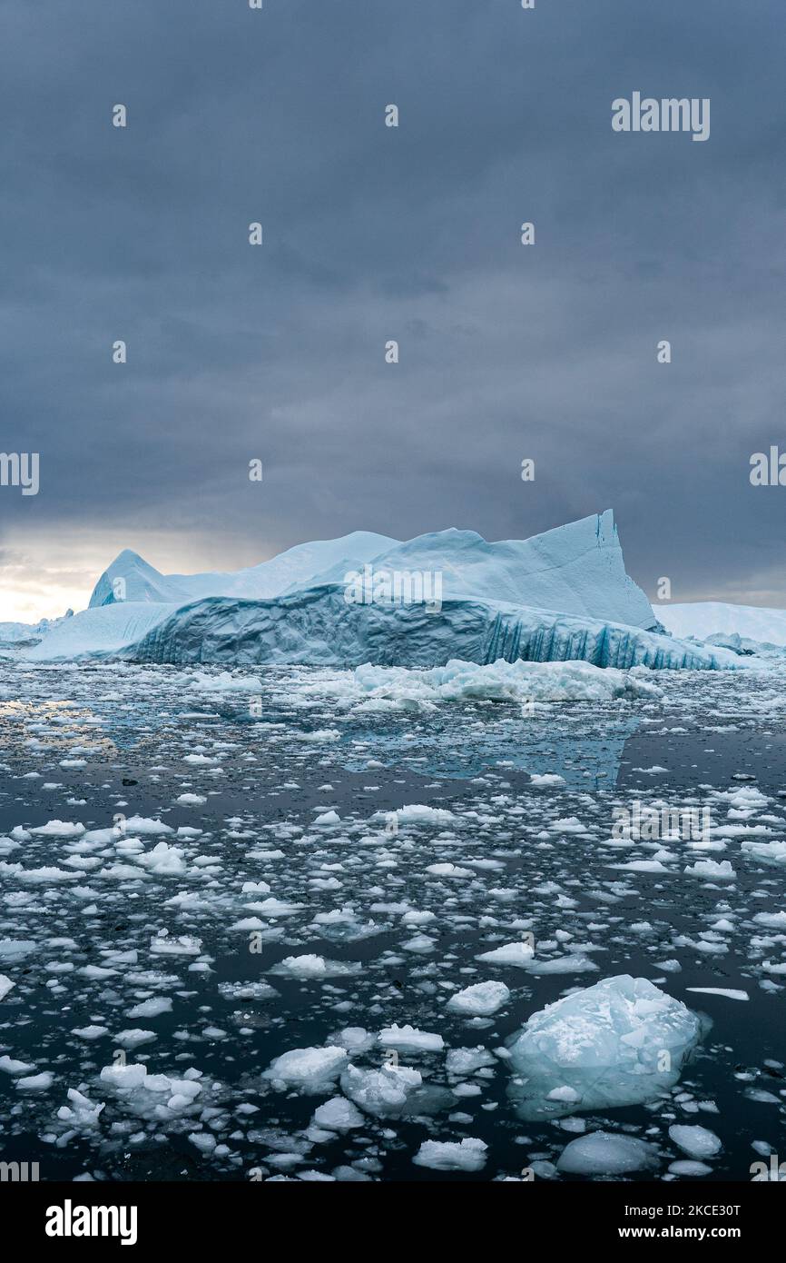 Icebergs near Ilulissat, Greenland. Climate change is having a profound ...