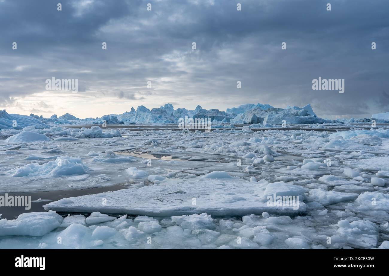 Icebergs near Ilulissat, Greenland. Climate change is having a profound ...