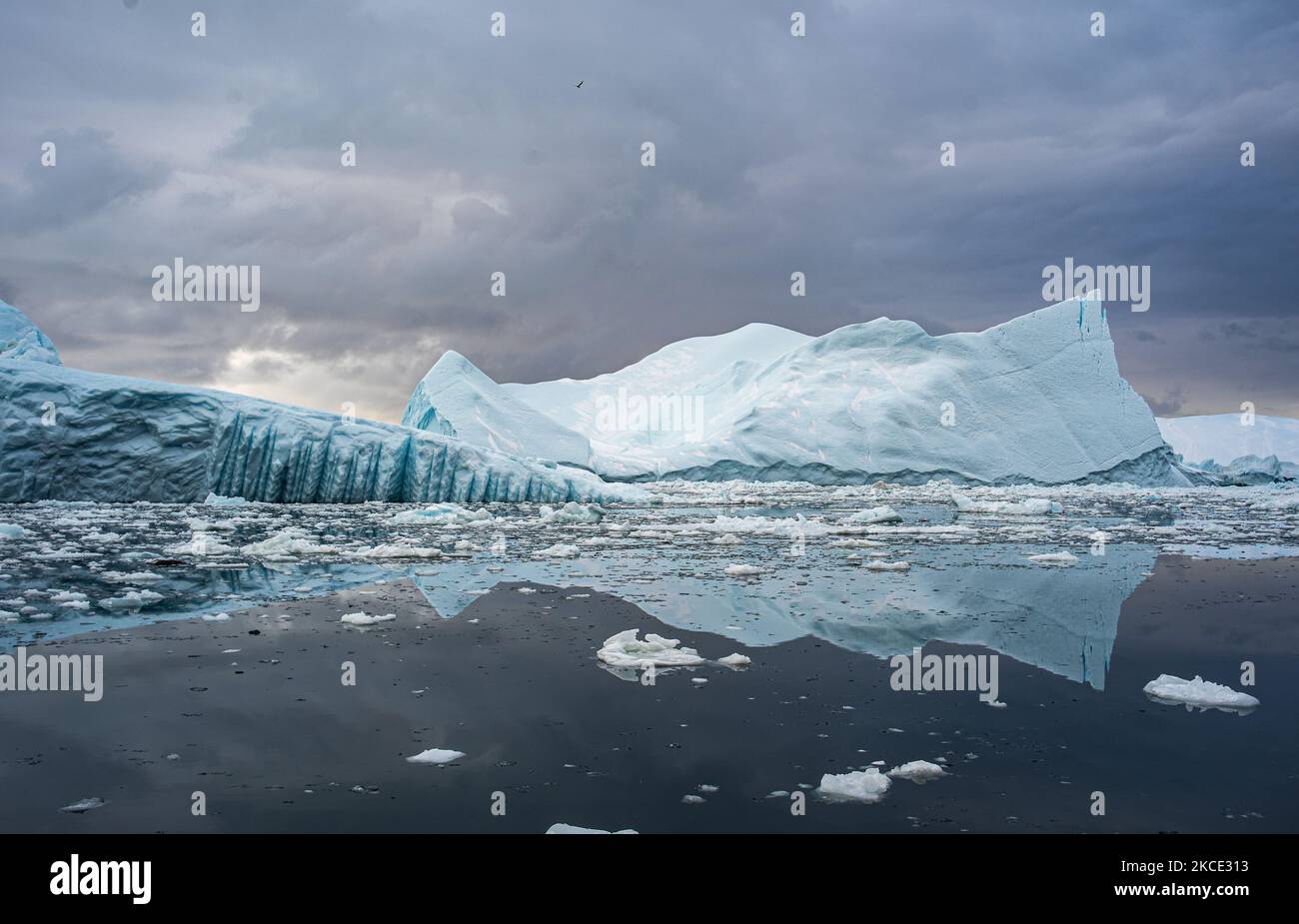Icebergs near Ilulissat, Greenland. Climate change is having a profound ...
